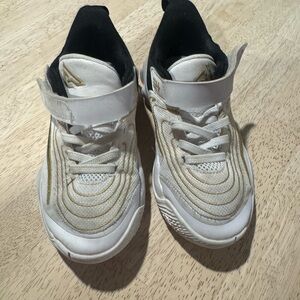 Kids White and Gold Nike Sneakers